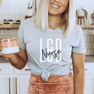 Labor And Delivery Nurse Shirt, L&D Nurse, RN Gift, Nursing School Grad, Clinicals Shirt, Baby Nurse, Cute nurse shirt, Unisex Graphic Tee
