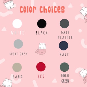 May include: Color choices for a product: white, black, dark heather, sport grey, navy, sand, red, and forest green. The colors are displayed as circles on a pink background with a cartoon cat illustration.