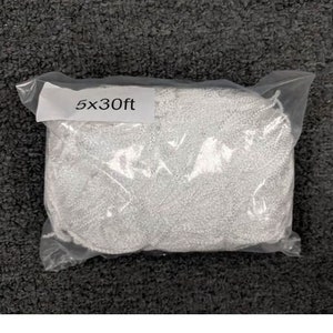 以下が含まれることがあります： 透明なプラスチック袋に入れた、白の5x30フィートのネットロール