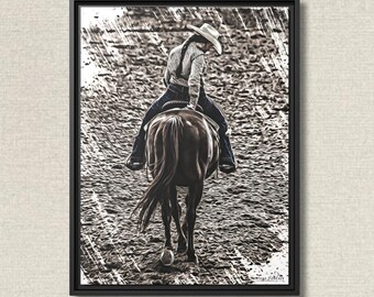 May include: A framed black and white print of a person riding a horse. The rider is wearing a cowboy hat, button-down shirt, and jeans. The horse is brown, and the background is a textured, grainy pattern.