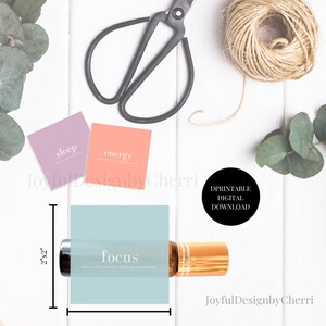 May include: Printable digital download of three 2x2 inch square labels with the words "sleep", "energy", and "focus" in white text on a pastel background. The labels are designed to be used on essential oil roller bottles.