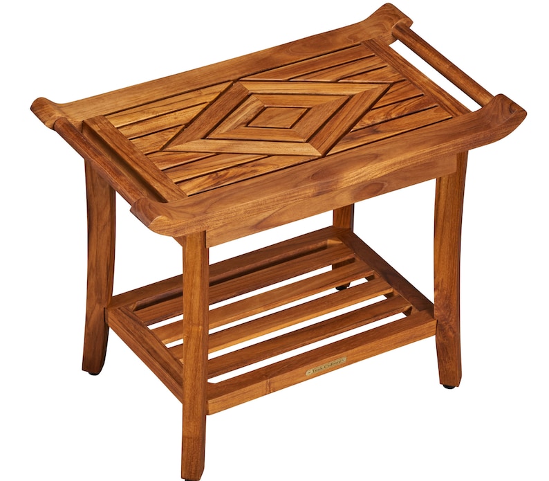 May include: A brown wooden side table with a geometric pattern on the top and a lower shelf. The table has a slightly curved design and a small brass plaque on the bottom shelf.