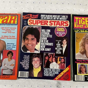 May include: Three vintage Tiger Beat magazines featuring teen idols Erik Estrada, Leif Garrett, and Shaun Cassidy. The covers feature photos of the stars and headlines about their careers and personal lives. The magazines are from the 1970s and 1980s.