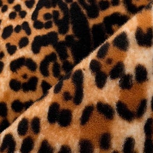 Piel de oveja con estampado de leopardo para manualidades, bolsos y disfraces.