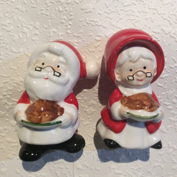 Vintage Christmas Mr & Mrs Santa Claus hand painted salt and pepper shakers. Perfect Gift