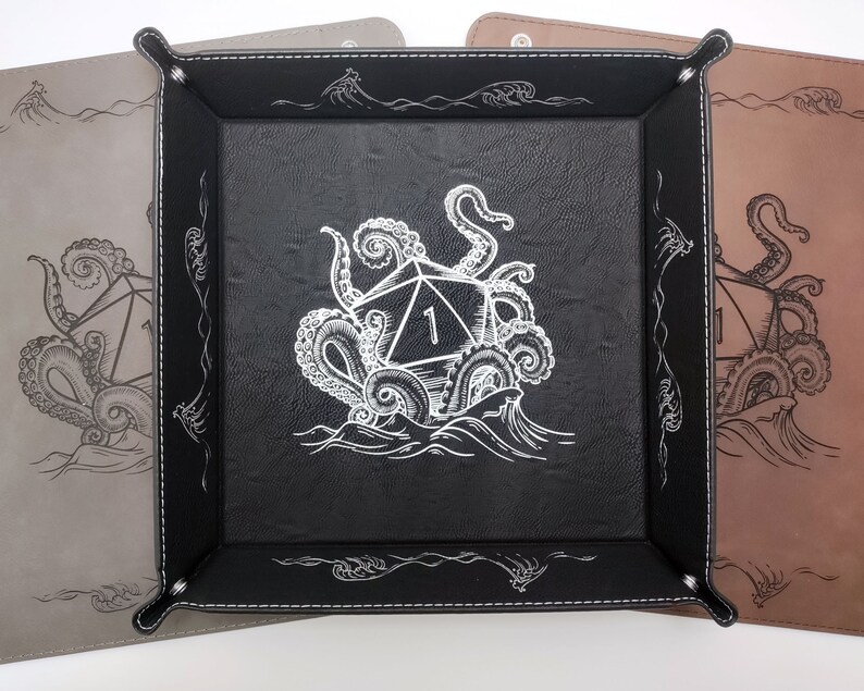 Three Kraken dice tray design options: gray with black, black with silver, dark brown with black