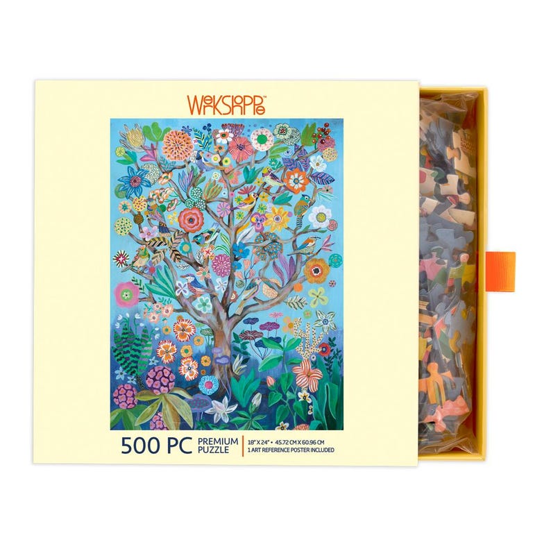 K&ouml;nnte beinhalten: Ein 500-teiliges Puzzle in einer gelben Box mit einem farbenfrohen Baumdesign mit Blumen und V&ouml;geln. Die Box zeigt den Text "WAKSIAPP" und "PREMIUM PUZZLE". Das Puzzle misst 45,72 cm x 60,96 cm.