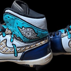 Ice cream drip baseball cleats