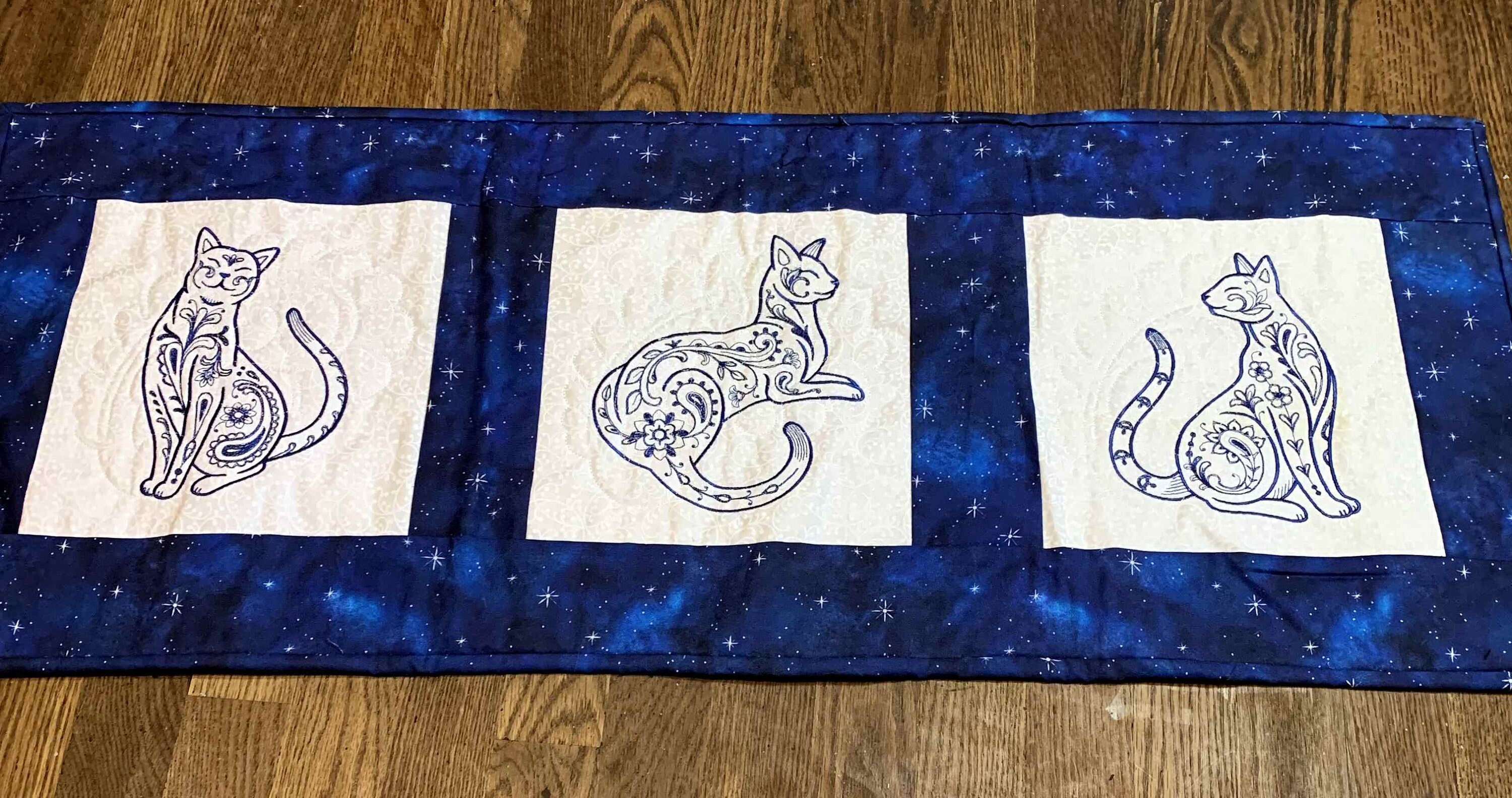 Embroidered Paisley Cats Table Runner: Reversible Quilted Centerpiece