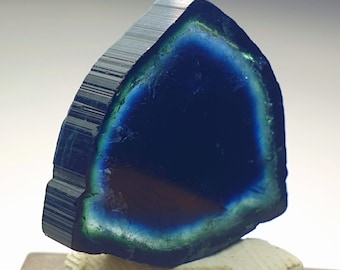 Top quality dark blue indicolite terminated tourmaline polished slice