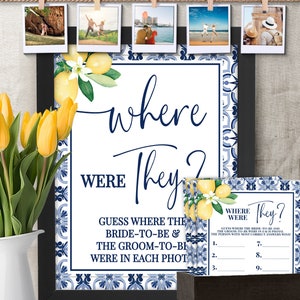 May include: A printable game for a bridal shower or wedding. The game is called "Where Were They?" and asks guests to guess where the bride and groom were in each photo. The photos are displayed on a string with clothespins. The game cards are decorated with a lemon and blue tile pattern.