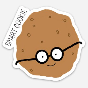 May include: A brown cookie with a smiling face wearing black-rimmed glasses. The text "SMART COOKIE" is written on the left side of the cookie.
