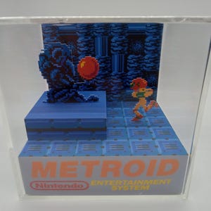 Metroid Samus finds a Chozo Shadow Box Diorama Cube
