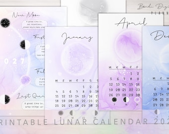 May include: A 2027 printable lunar calendar set featuring watercolor-style backgrounds in shades of purple and blue. The pages display monthly grids for January, April, and December, alongside moon phase diagrams with text labels like New Moon.