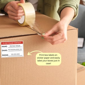 May include: A brown cardboard box with a white label that says "IF LOST PLEASE CONTACT:" with fields for name, email, and phone number. The box is being taped shut with clear tape. Text on a yellow background says "Print box labels on sticker paper and easily label your boxes just in case!"
