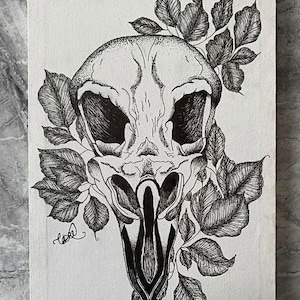 Crow skull with gothic style leaves
