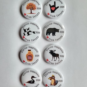 May include: A selection of white circular badges with Canadian imagery. Each badge displays the text "Eternal Happiness 2026 from Canada." Designs include a tree, hand with heart, geese, bear, maple syrup, moose, loon, and beaver.