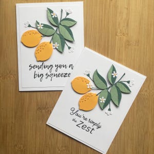 Carte vierge faite main de citrons sur une branche avec divers dictons