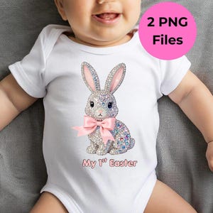 May include: White baby bodysuit with a sparkling bunny design, a pink bow, and the text "My 1st Easter". The design includes colorful gems and the text "2 PNG Files" in a pink circle.