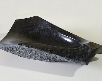 Black stone bowl irregularly shaped