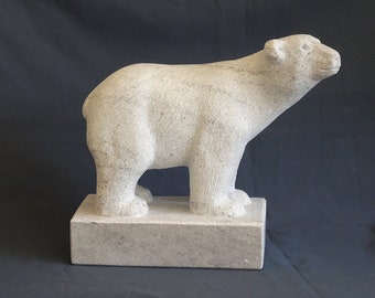 Polar bear, bear sculpture carved from natural stone. Marble polar bear.