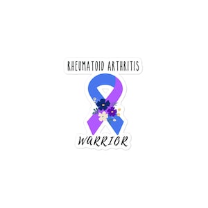 May include: A blue and purple ribbon with flowers, representing rheumatoid arthritis, with the text "Rheumatoid Arthritis Warrior" on a white background.