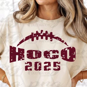 May include: Cream-colored t-shirt with a maroon football graphic and the text "HOCO 2025." The shirt also includes the text "T-shirt Not Included." The image is a digital download with a high-quality design.