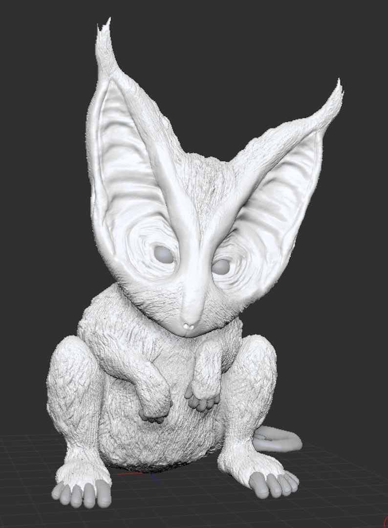May include: A white, furry, 3D printed model of a creature with large, pointed ears and a small, pointed nose. The creature is sitting on its haunches with its paws tucked in front of it.