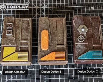 May include: Three different design options for a brown, textured, rectangular panel with various colored accents. Option A has a yellow accent, option B has an orange accent, and option C has a blue accent.