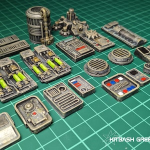 May include: A collection of 17 miniature 3D printed sci-fi themed models, including panels, pipes, and a cylindrical tank. The models are painted in a weathered, industrial style with shades of gray, black, and green.
