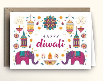 May include: A white greeting card featuring the text Happy diwali in dark pink and purple. The design includes two pink elephants, four colorful hanging lanterns, a central mandala, and a lit diya lamp, all surrounded by small floral motifs.
