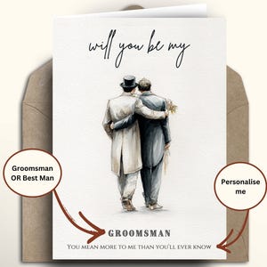May include: A wedding card with a watercolor illustration of two grooms in formal attire, embracing. The card reads "will you be my" above the image, with "Groomsman" and "You mean more to me than you'll ever know" below. The card is in a kraft paper envelope.