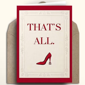 May include: Greeting card with a red border and the words "THAT'S ALL." in red. A red high-heeled shoe with a trident heel is at the bottom. The card is inside a brown envelope.
