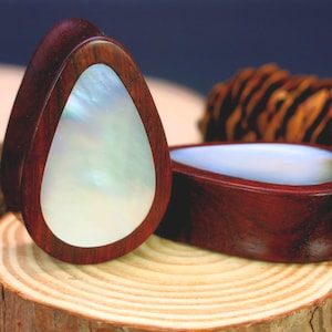 Custom Made Red Wood Classic Teardrop Gauged Ear Plugs with White Pearl Shell Inlay. Mother of Pearl Inlaid Blood Wood Ear Plugs
