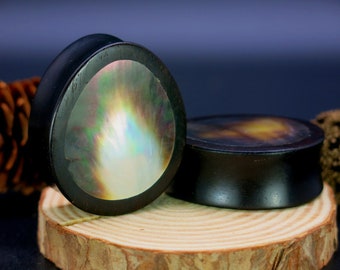 A Pair of gorgeous Oval Teardrop Ear Plugs with Black Pearl Shell Inlay for Ear Stretching. Wooden Oval Ear Plugs with Inlaid Shell.