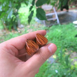 A Pair of Handmade Coconut Palm Wood Tall Teardrop Gauged Ear Plugs for Earlobe Stretching. Custom Made Coconut Wooden Teardrop Earrings