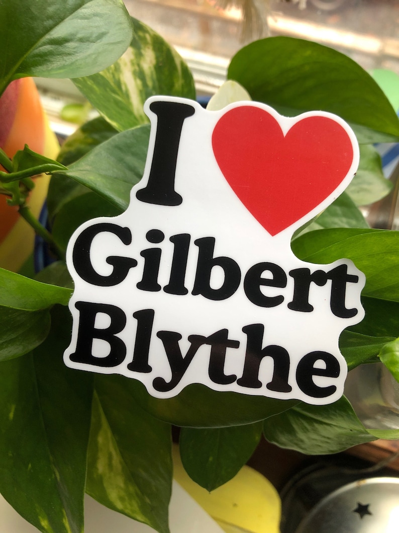 May include: White sticker with black text that reads "I love Gilbert Blythe" with a red heart in the middle.