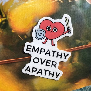 Radical empathy over apathy cute warrior heart counselor therapy emotional justice Vinyl Sticker