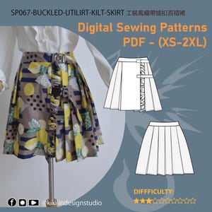 May include: A pleated kilt skirt featuring a brown background with a yellow lemon and green leaf print, accented by dark blue horizontal stripes and two metal buckles. The image includes technical line drawings of the skirt design and text.