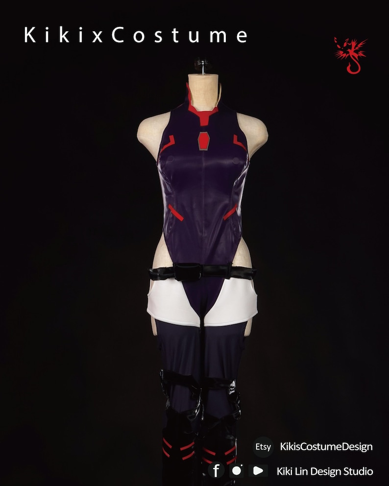 May include: A purple and red bodysuit with a white skirt and black leggings. The bodysuit has a high collar and a red design on the front. The skirt is short and has a white trim. The leggings are long and have a black trim.