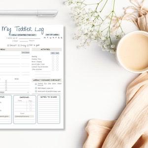 May include: A printable toddler log with sections for daily activities, meals, sleep, nappy changing, and a weekly cleaning checklist. The log is designed with a light grey and white colour scheme.
