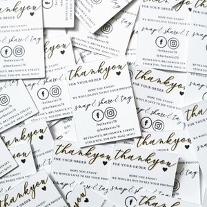 May include: A pile of white business cards with gold lettering. The cards say "thank you" and feature social media icons. The cards also include the text "For your order" and "Hope you enjoy!"