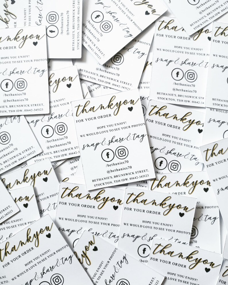 May include: A pile of white business cards with gold lettering. The cards say "thank you" and feature social media icons. The cards also include the text "For your order" and "Hope you enjoy!"