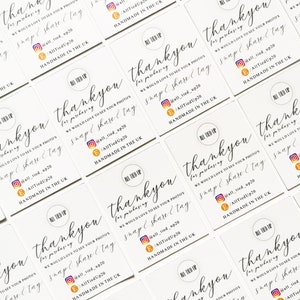 May include: A collection of white business cards featuring the words "thank you" in cursive script. The cards also display social media details and state "handmade in the UK". The cards are laid out in a grid.