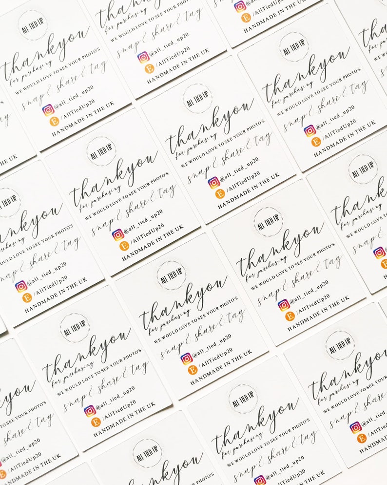 May include: A collection of white business cards featuring the words "thank you" in cursive script. The cards also display social media details and state "handmade in the UK". The cards are laid out in a grid.