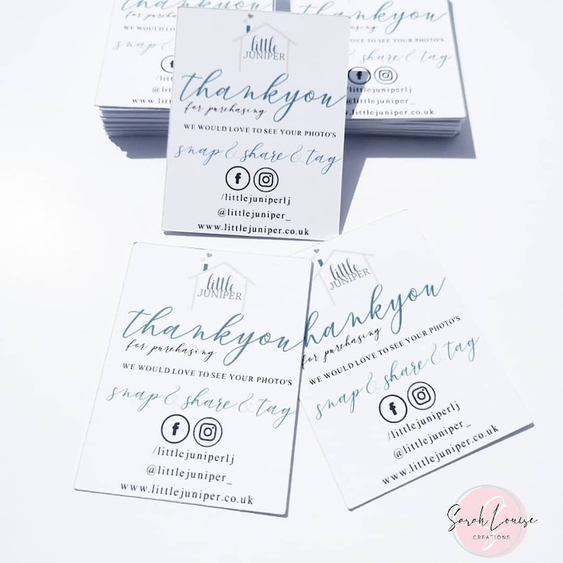 May include: White thank you cards with teal script. The cards say "thank you for purchasing" and include social media handles. The Little Juniper logo is at the top. The cards are stacked and scattered on a white surface.