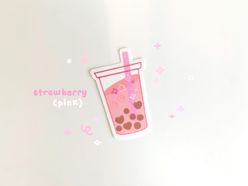 May include: Pink and white sticker of a pink bubble tea with brown boba pearls and a pink straw. The text "strawberry (pink)" is written below the bubble tea.