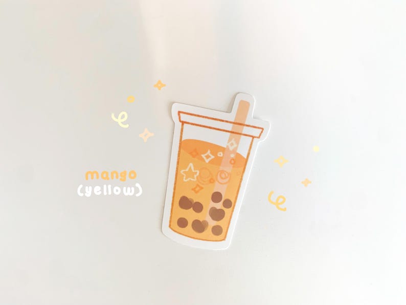 May include: A sticker of a yellow mango boba tea with a straw and white stars and swirls inside. The text "mango (yellow)" is below the boba tea.