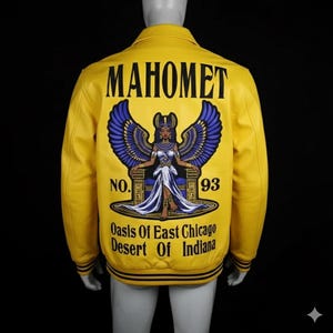 May include: A yellow leather jacket with black and blue detailing. The back displays a graphic of a woman with blue wings and the word "MAHOMET". Below the graphic are the words "Oasis Of East Chicago Desert Of Indiana" and the number "93".