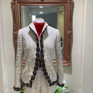 Women suit made from summer tweed (jacket and shorts/skirt)
